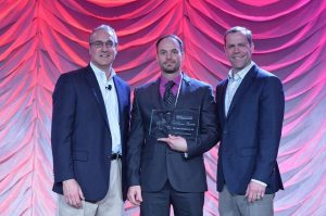 Eric Ward, Vice President of Operations accepts the prestigious Platinum Warranty Registration Award 