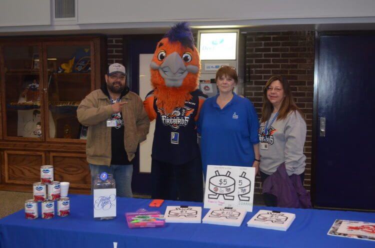 stuff the truck cl ward flint firebirds catholic charities 2016
