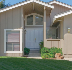 Beige house with old entry door