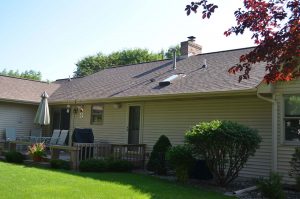 A small, stylish home with a strong, attractive Owens Corning roof